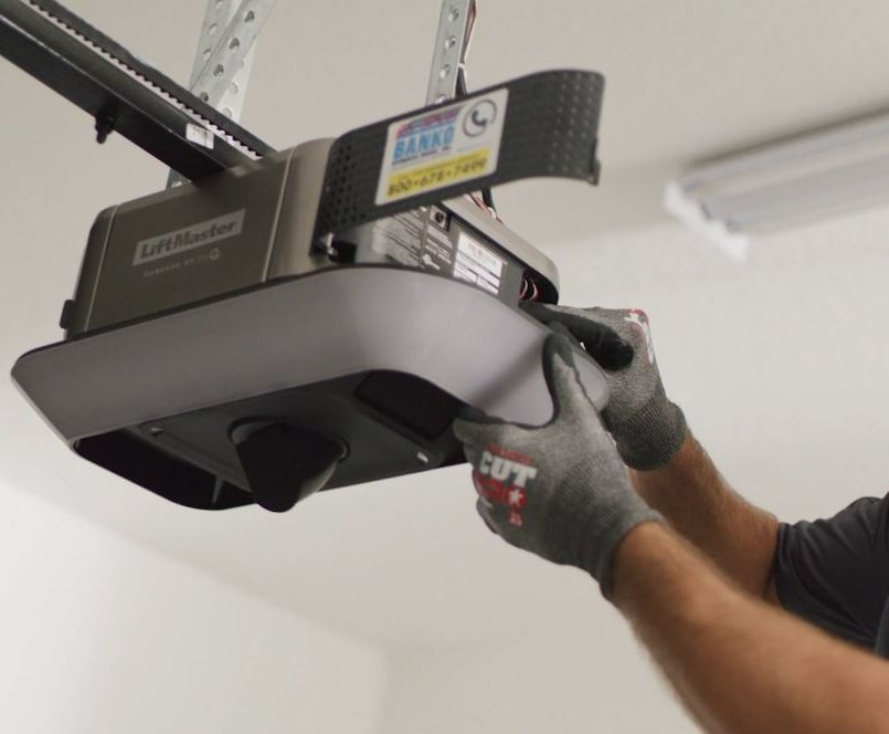 Technician performing garage door opener repair in Bradenton, Florida for reliable and efficient service